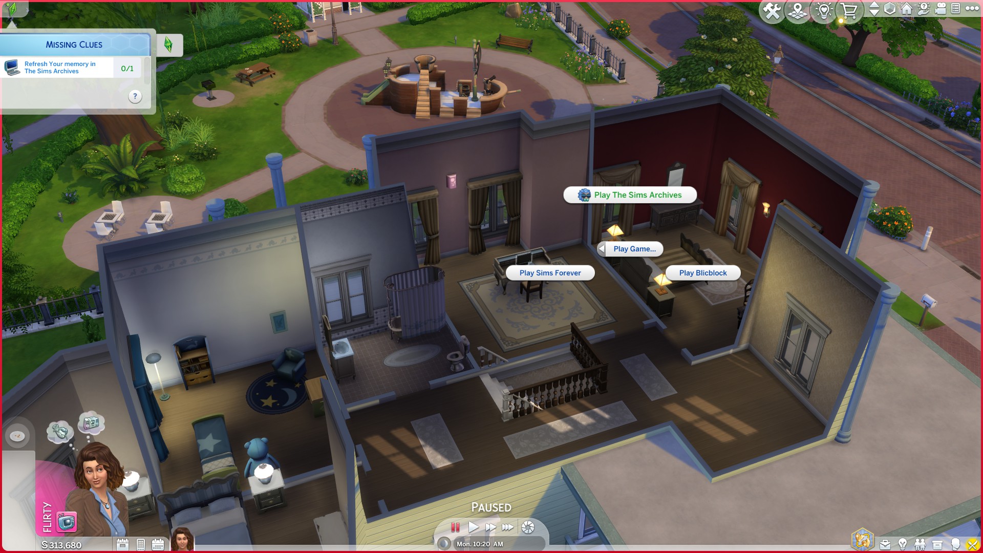 An image showing a Sim at the computer in The Sims 4.
