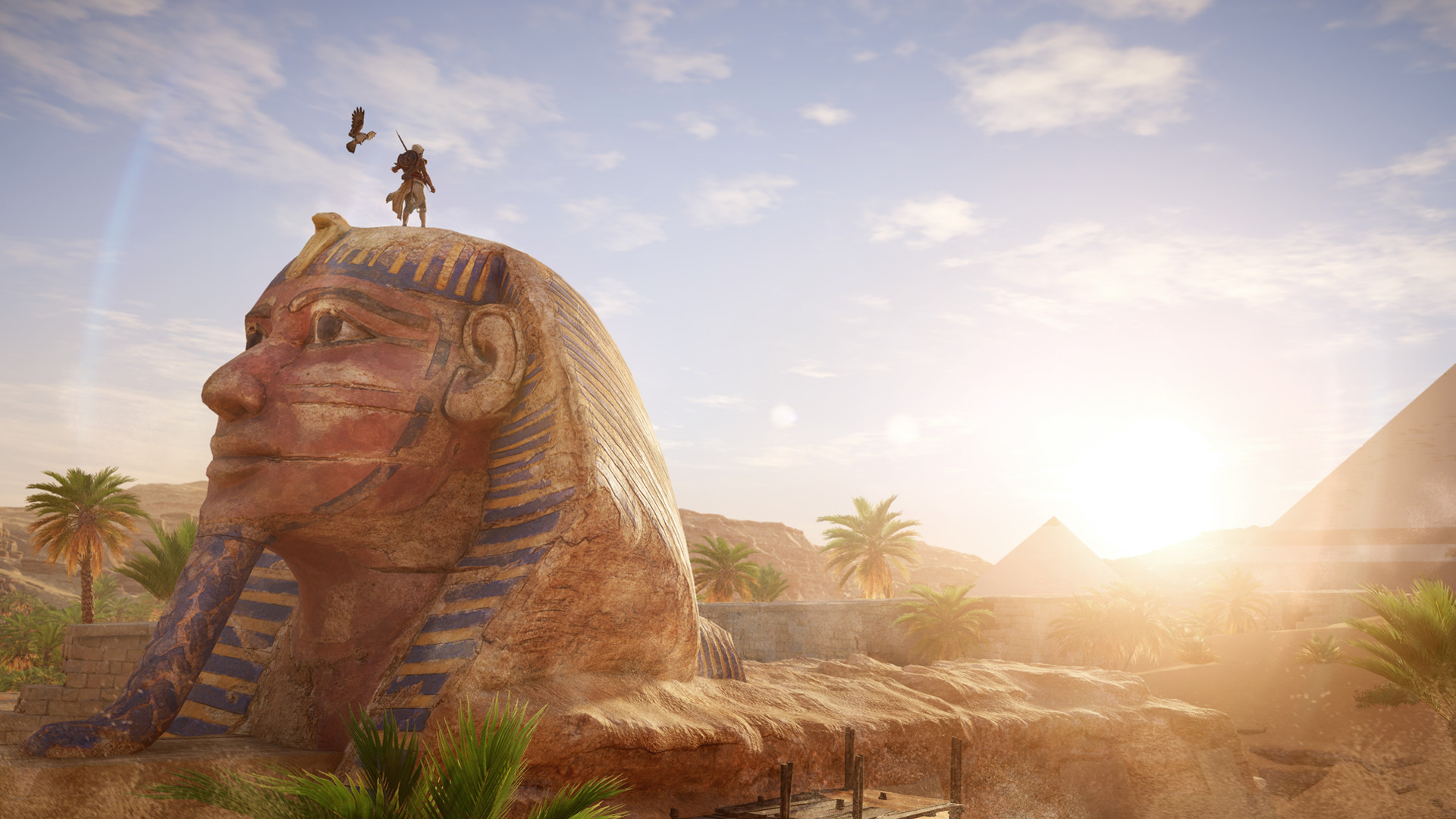 Bayek stands atop a sphinx in 2017’s Assassin’s Creed Origins.