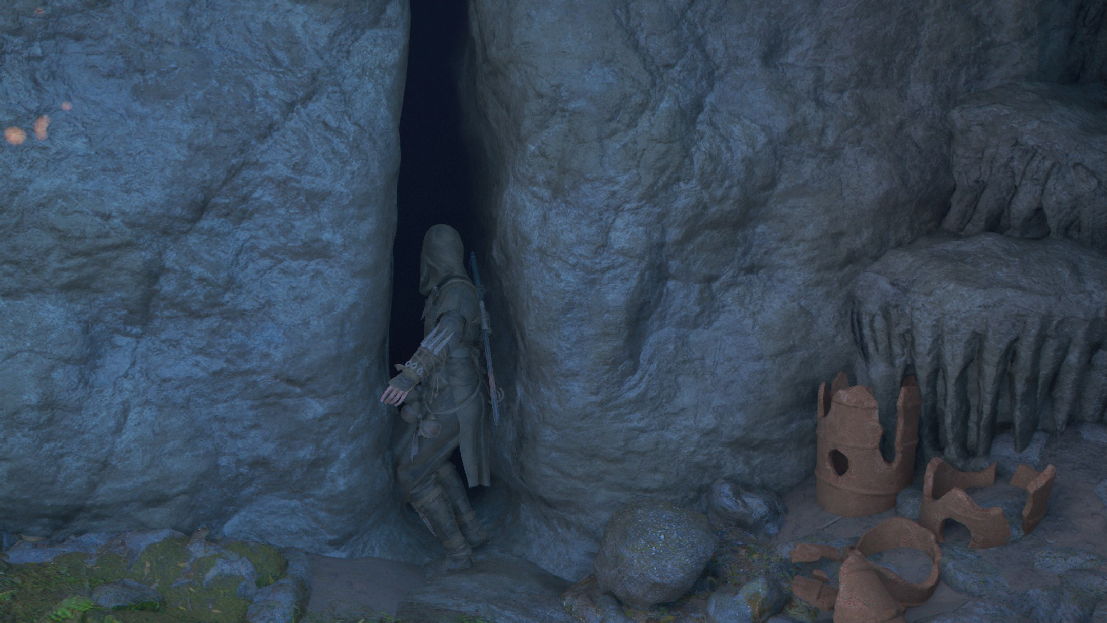 Naoe enters a kofun through a thin crevice in Assassin’s Creed Shadows