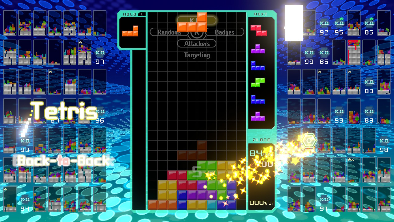 Sending garbage blocks to another player in Tetris 99