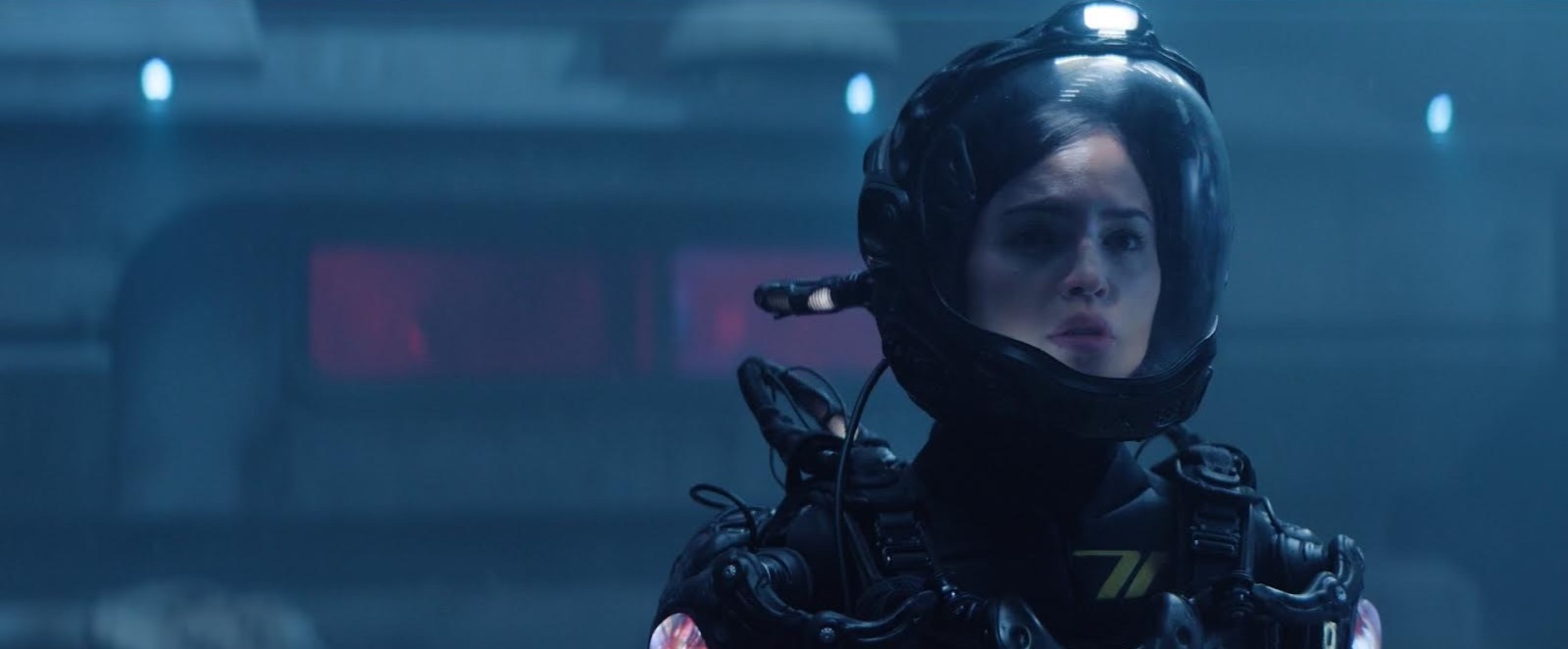 Eiza González wearing a futuristic space suit in Ash (2025).