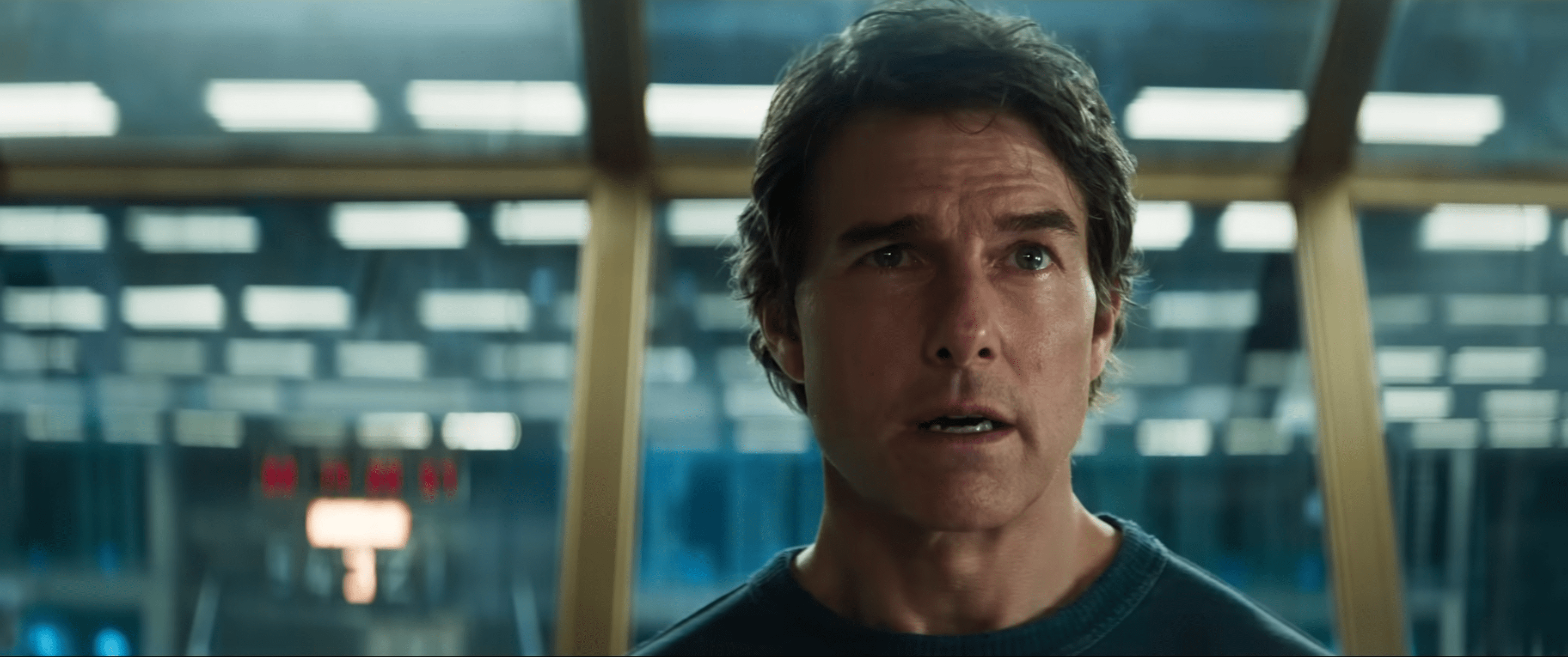 Tom Cruise as Ethan Hawke, looking concerned, in Mission: Impossible — Dead Reckoning.