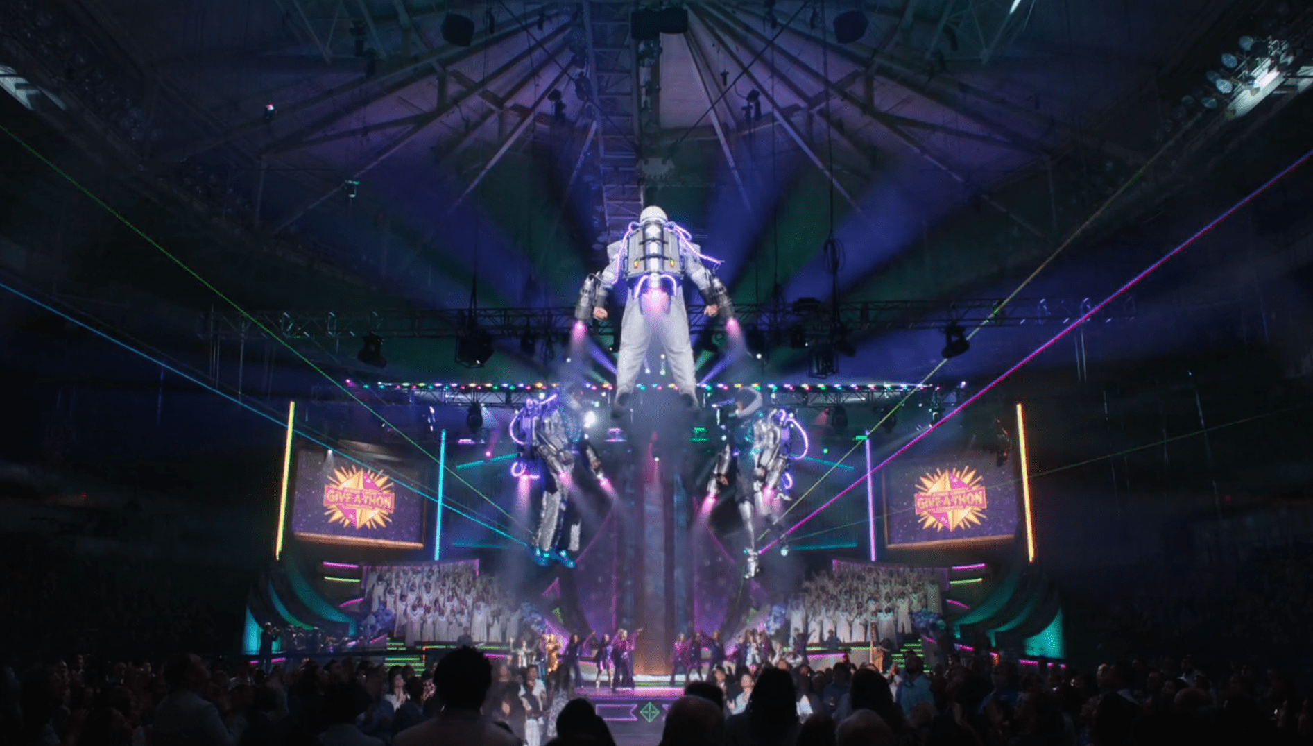 Three performers hover in jetpacks in a mega church in The Righteous Gemstones
