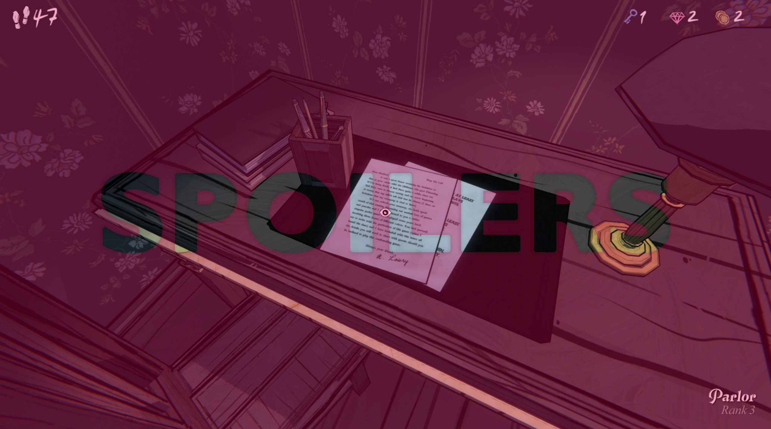 A graphic that shows the word: “SPOILERS” layered over an image of a desk in Blue Prince.