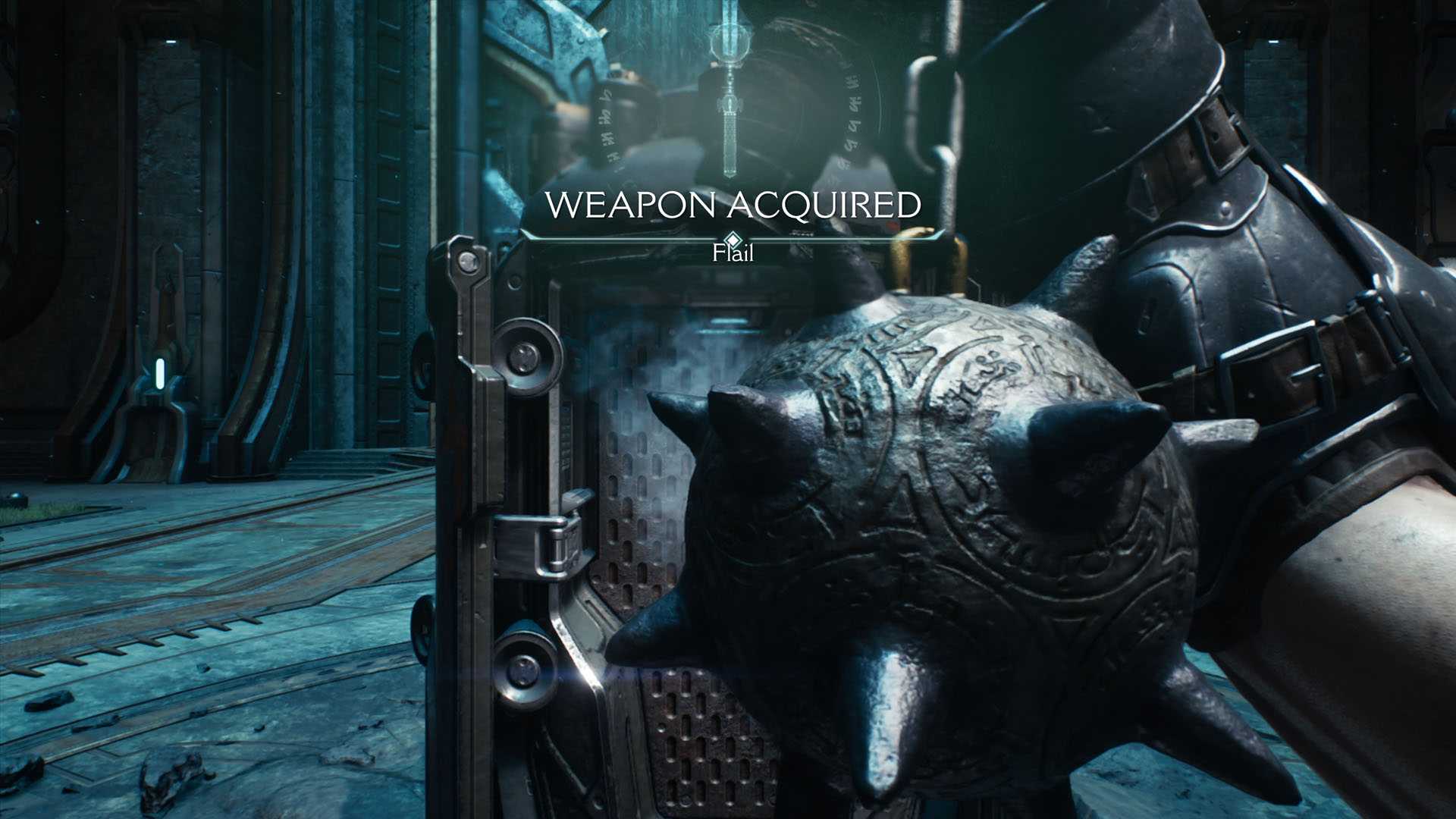 A Doom: The Dark Ages screenshot showing the Doom Slayer’s right hand holding a flail.