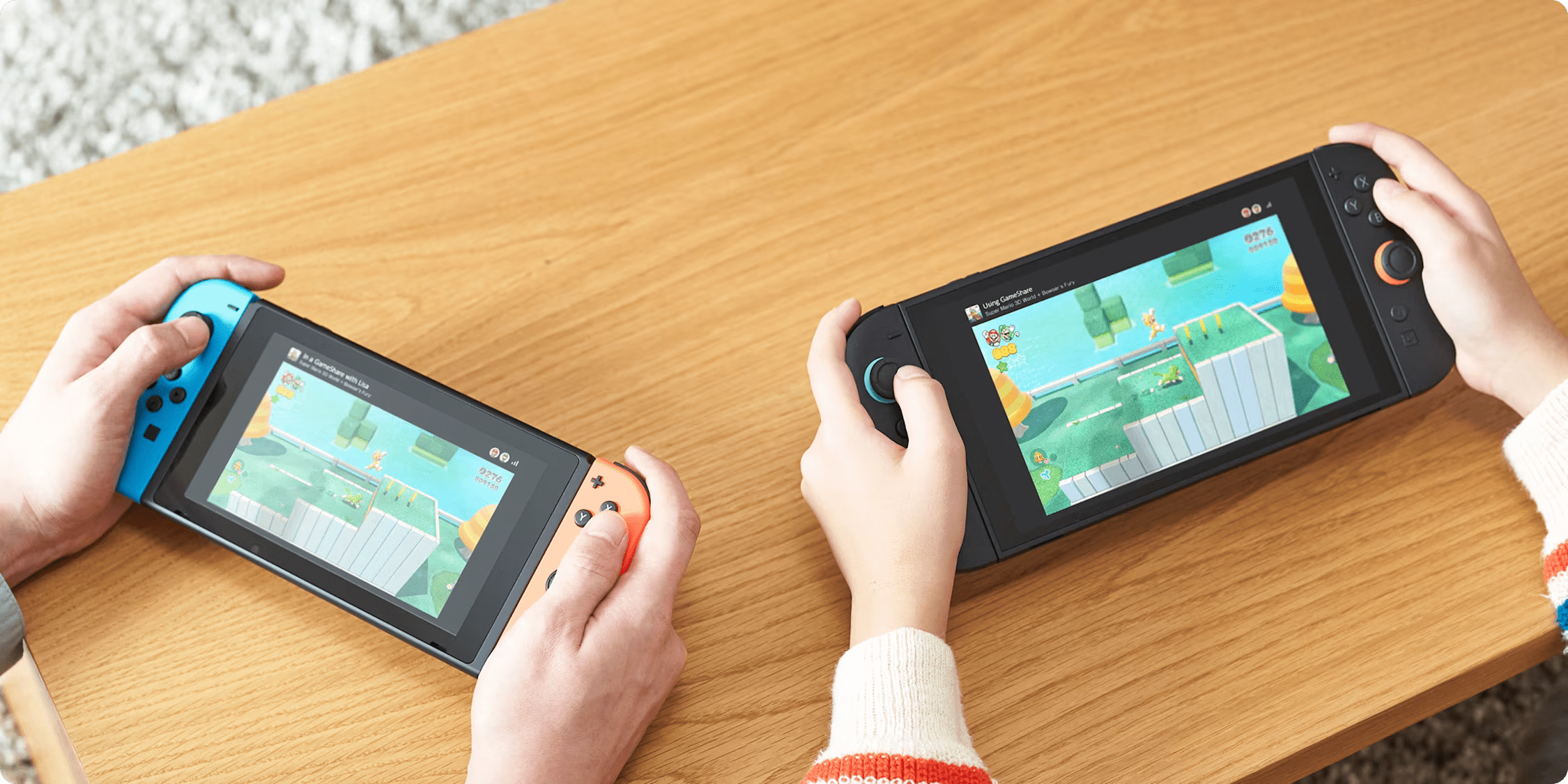 A Nintendo Switch 2 and Nintendo Switch play a game via GameShare