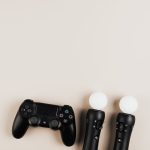 A person holding a gaming controller ready to play a first-person shooter