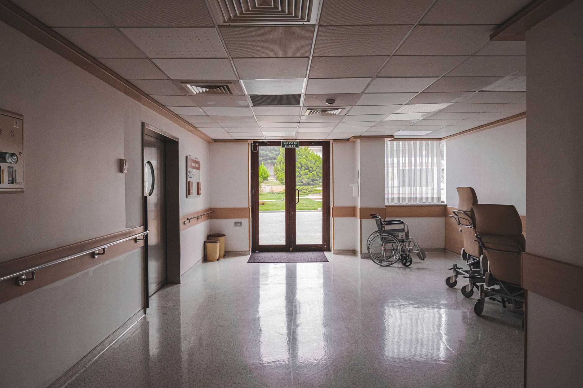 A dark and empty hospital corridor representing the setting of Fear The Timeloop