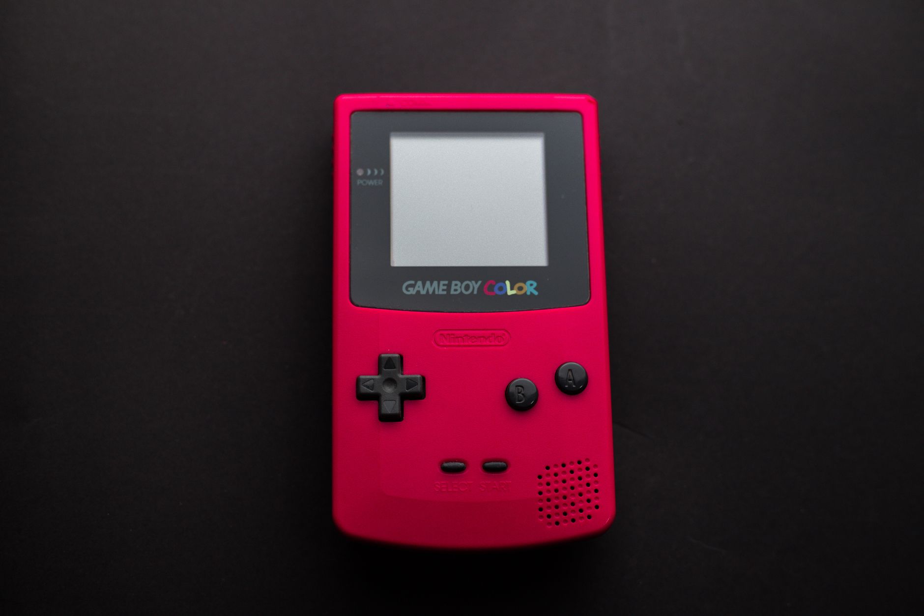 A handheld gaming console referencing the original PS Vita release of Muramasa