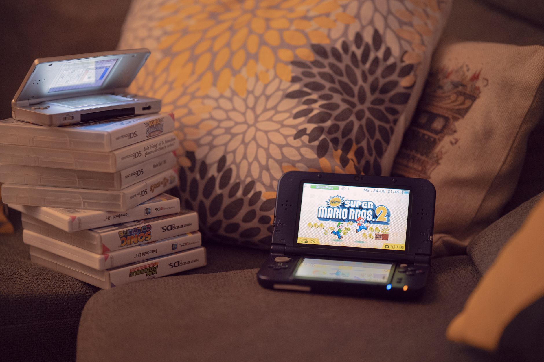A game cartridge card held in hand