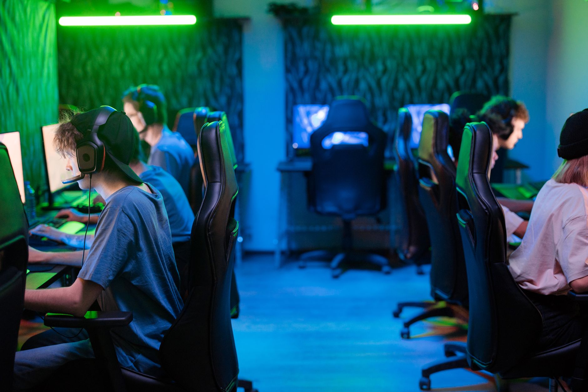Game developers working in a studio environment