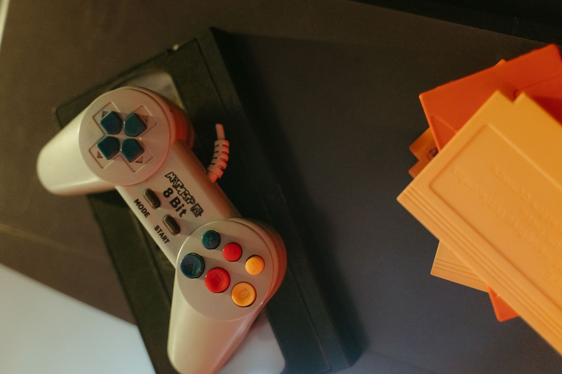 Physical game cartridge next to a console